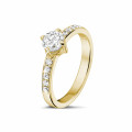 0.70 Karat Diamant Solitärring aus Gelbgold mit kleinen Diamanten