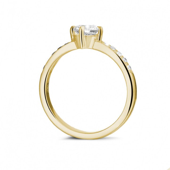 0.70 Karat Diamant Solitärring aus Gelbgold mit kleinen Diamanten