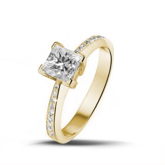 Verlobung - 1.00 Karat Solitärring aus Gelbgold mit Prinzessdiamanten und kleinen Diamanten