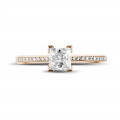 0.75 Karat Solitärring aus Rotgold mit Prinzessdiamanten und kleinen Diamanten