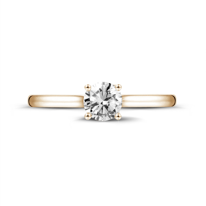 0.70 Karat Solitärring aus Rotgold mit rundem Diamant und 4 Krappen