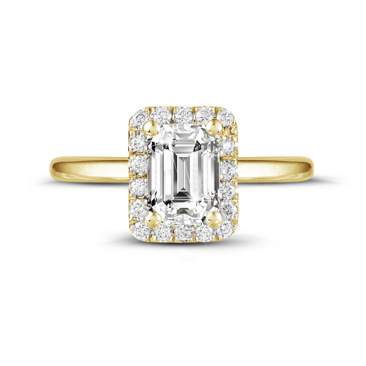 1.50 Karat Halo Solitärring mit Diamant im Smaragdschliff aus Gelbgold mit runden Diamanten