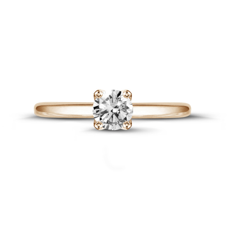 0.90 Karat Solitärring aus Rotgold mit rundem Diamant