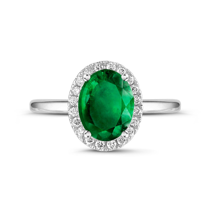 Halo Solitärring aus Weißgold mit ovalem Smaragd