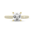 1.20 Karat Solitärring mit Diamant im Asscher-Schliff und hidden halo aus Gelbgold 