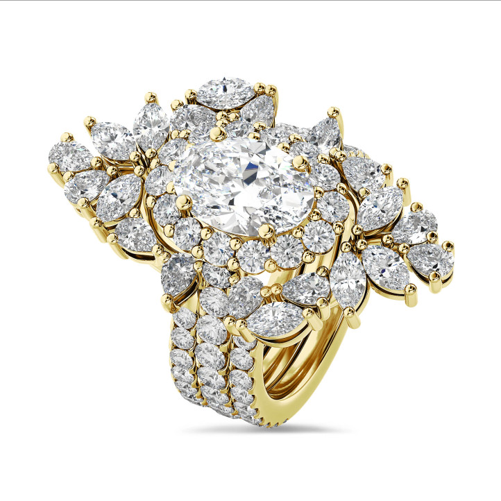 Maßgefertigter Entourage-Ring mit einem ovalen Diamanten