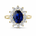 Entourage Ring aus Gelbgold mit ovalem Saphir und runde Diamanten