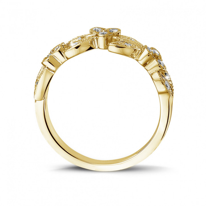 0.32 Karat Memoire Ring mit kleinen Blättern aus Gelbgold mit runden Diamanten