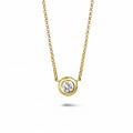0.70 Karat Diamant Anhänger in Zargenfassung aus Gelbgold