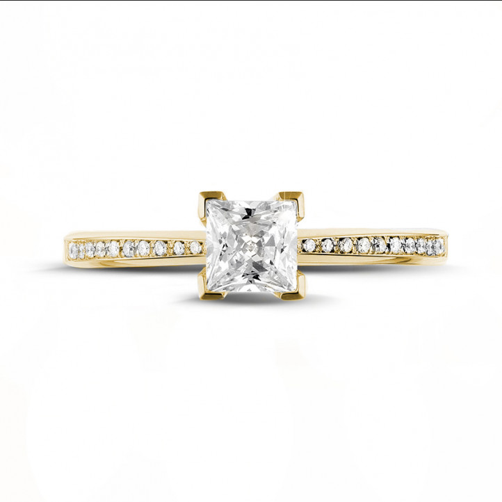 0.70 Karat Solitärring aus Gelbgold mit Prinzessdiamanten und kleinen Diamanten