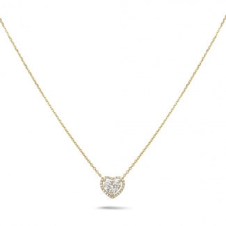 Halsketten - 0.65 Karat herzförmige Halskette aus Gelbgold mit runden Diamanten