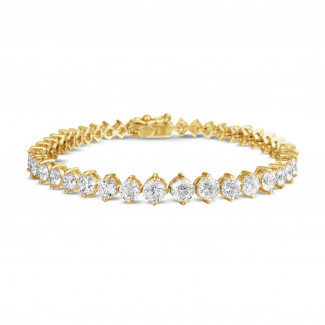 Armbänder - 7.40 Karat sich verjüngendes Diamant Armband aus Gelbgold