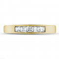 0.50 Karat Memoire Ring mit Prinzessdiamanten aus Gelbgold