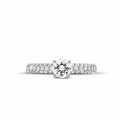 0.70 carat solitaire ring (half set) in platinum with side diamonds