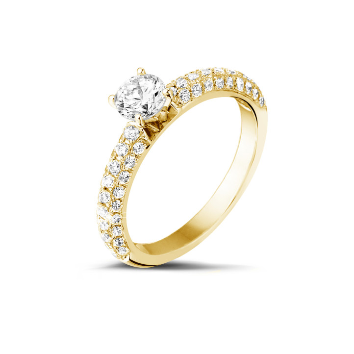 0.70 carat solitaire ring (half set) in yellow gold with side diamonds
