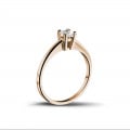 0.30 carat solitaire ring in red gold with princess diamond