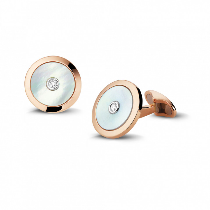 Red golden cufflinks with mother of pearl and a central diamond