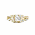 0.50 carat solitaire ring in yellow gold with princess diamond and side diamonds