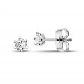 0.30 carat classic diamond earrings in platinum with six prongs