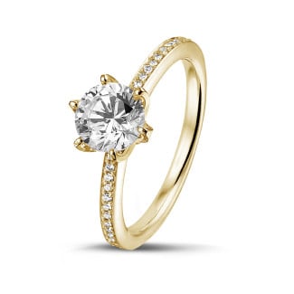 Gold ring - 1.00 carat solitaire ring in yellow gold with side diamonds