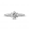 1.00 carat solitaire ring in white gold with side diamonds
