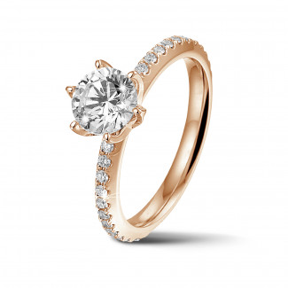 Engagement - 1.00 carat solitaire ring in red gold with side diamonds
