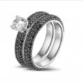 0.50 carat solitaire ring (half set) in white gold with black diamonds