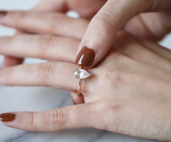 gemstone with pear cut in an engagement ring