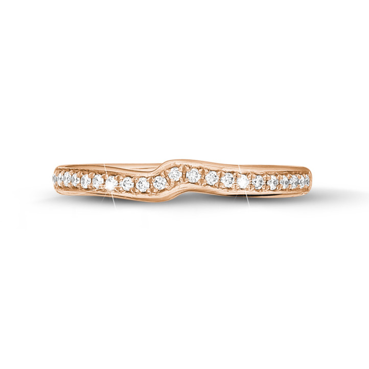 0.20 carat curved diamond eternity ring (half set) in red gold