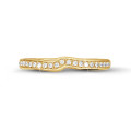 0.20 carat curved diamond eternity ring (half set) in yellow gold