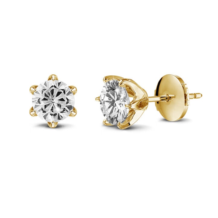 solitaire earrings in yellow gold with round diamonds of 1.25 Ct each