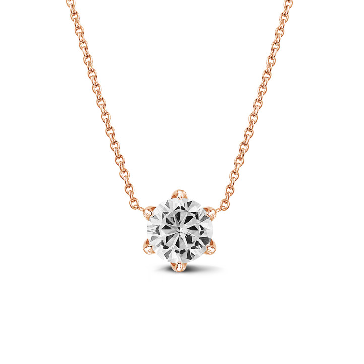 0.90 carat solitaire pendant in red gold with round diamond