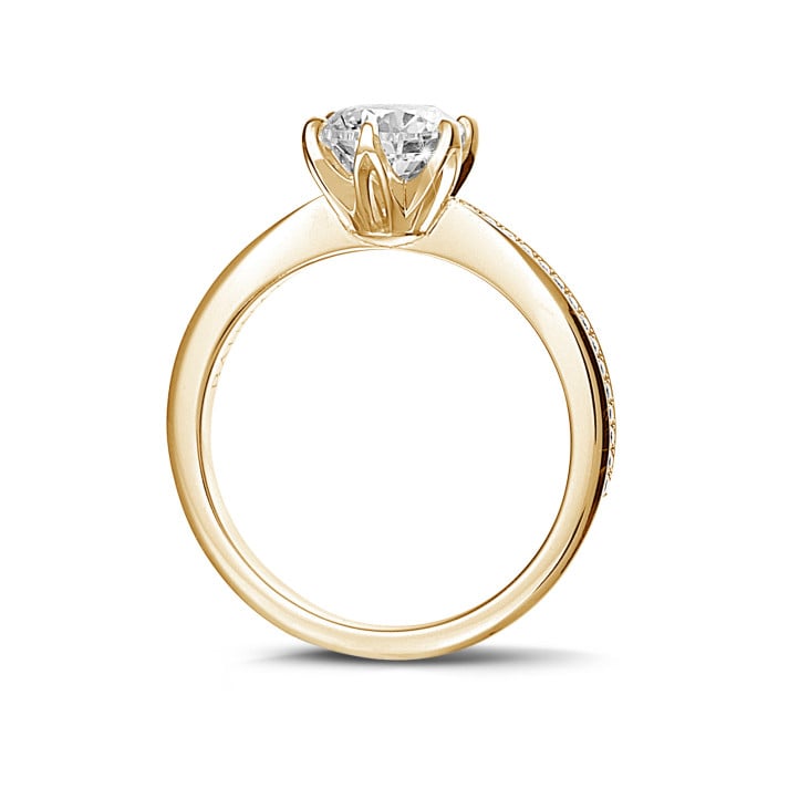 0.50 carat solitaire ring in yellow gold with side diamonds