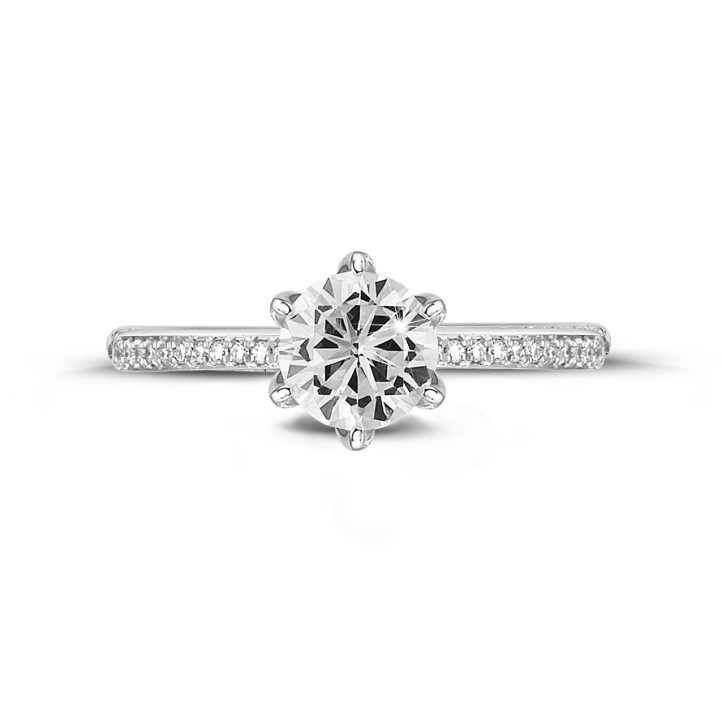 0.50 carat solitaire ring in white gold with side diamonds