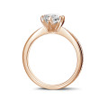 1.25 carat solitaire ring in red gold with side diamonds