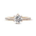 0.90 carat solitaire ring in red gold with side diamonds