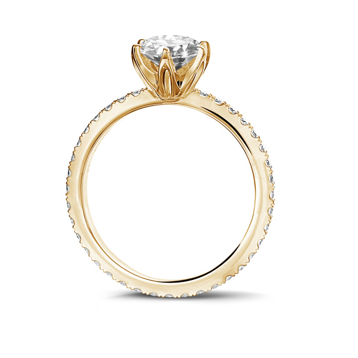 1.50 carat solitaire ring in yellow gold with side diamonds