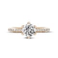 2.00 carat solitaire ring in red gold with side diamonds