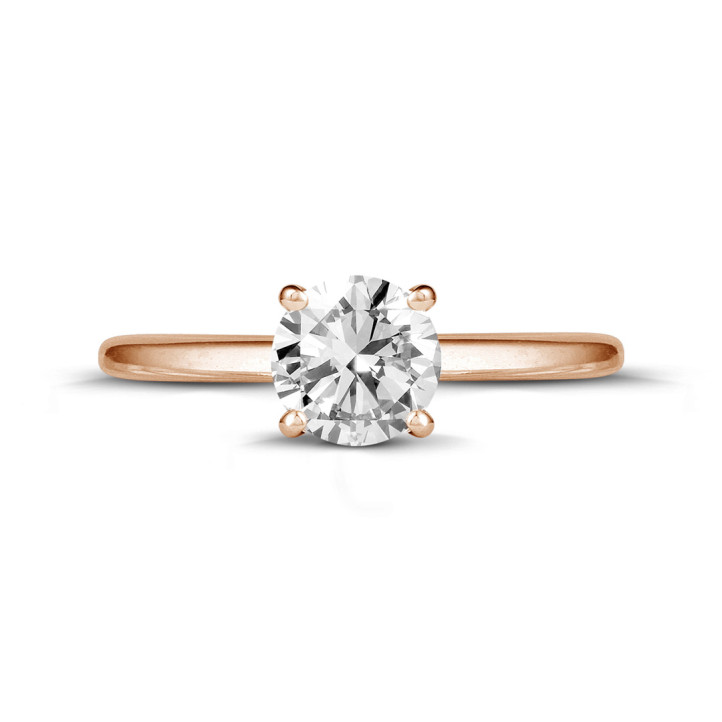 0.90 carat solitaire ring in red gold with round diamond and four prongs