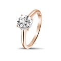 1.50 carat solitaire ring in red gold with round diamond and four prongs