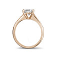 1.25 carat solitaire ring in red gold with four prongs and side diamonds