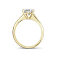 1.50 carat solitaire ring in yellow gold with four prongs and side diamonds