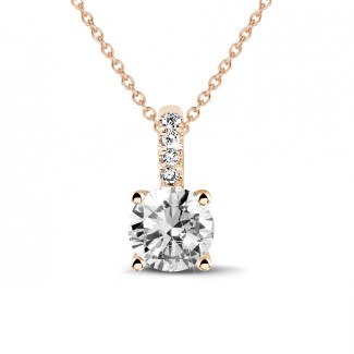 Necklaces - 1.00 carat solitaire pendant in red gold with four prongs and round diamonds