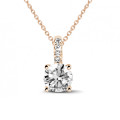 3.00 carat solitaire pendant in red gold with four prongs and round diamonds