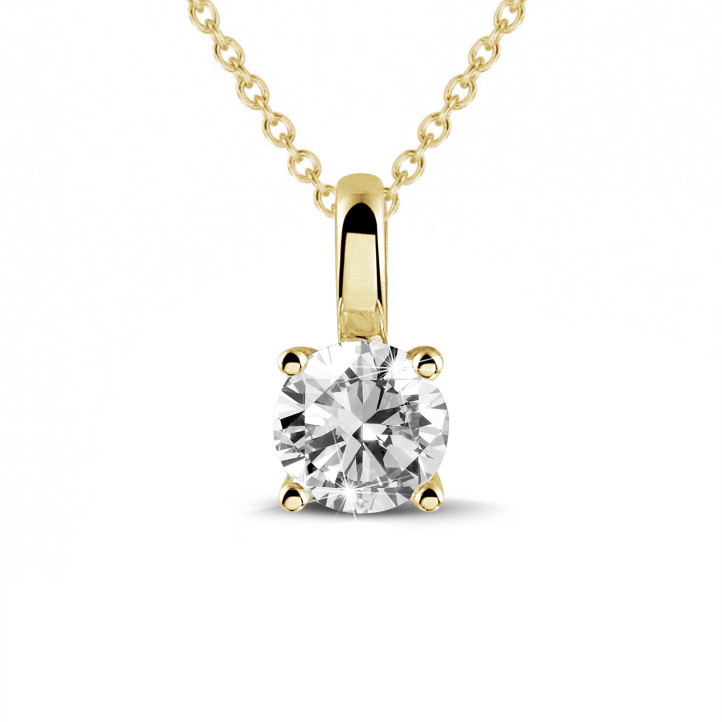 0.70 carat solitaire pendant in yellow gold with round diamond and four prongs