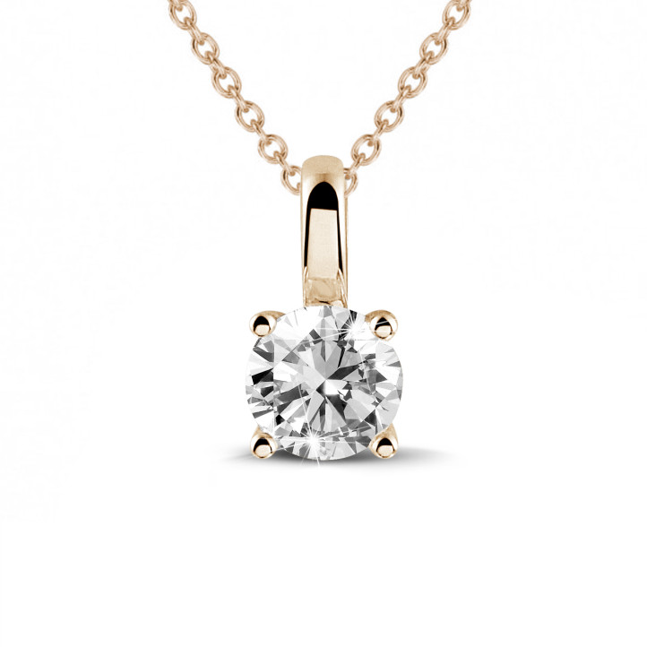 0.90 carat solitaire pendant in red gold with round diamond and four prongs