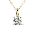 1.50 carat solitaire pendant in yellow gold with round diamond and four prongs