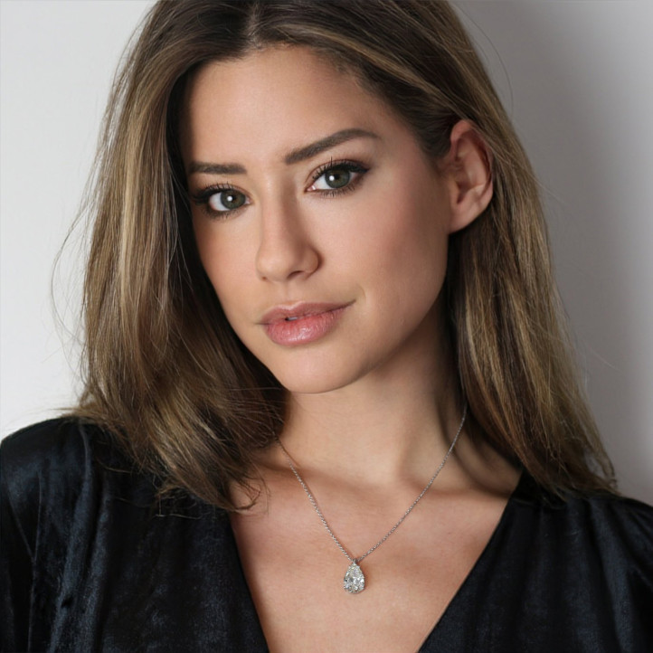 6.01 carat white golden solitaire pendant with pear shaped diamond