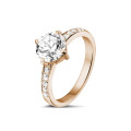 2.50 carat solitaire diamond ring in red gold with side diamonds