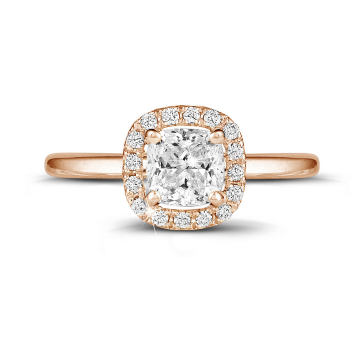 1.00 carat solitaire halo ring with a cushion diamond in red gold with round diamonds